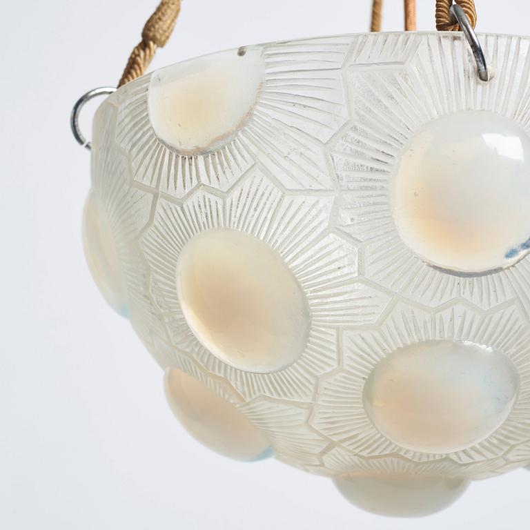 René Lalique, a 'Soleil' moulded opalescent glass ceiling light, France 1920-30s.