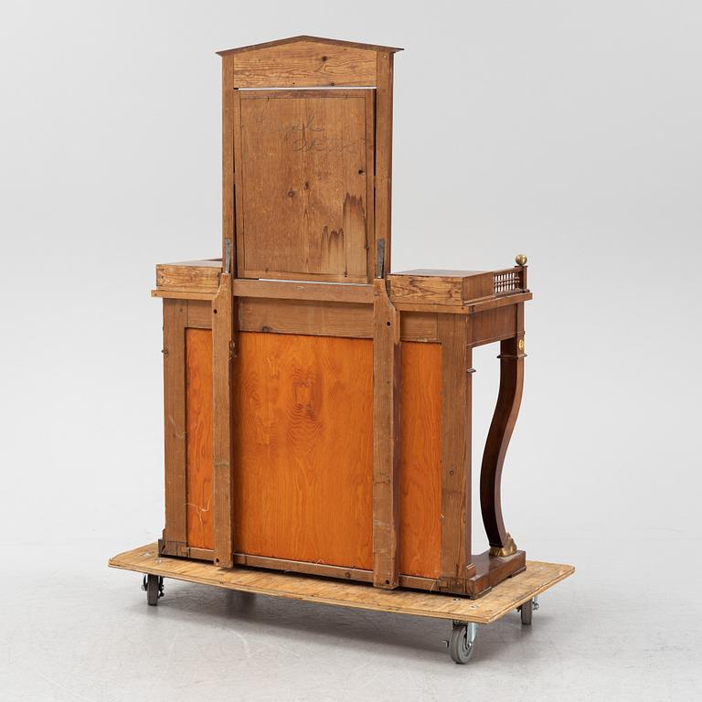 An Empire style dressing table by Johan Öman, Stockholm (1815-33), dated 1827.