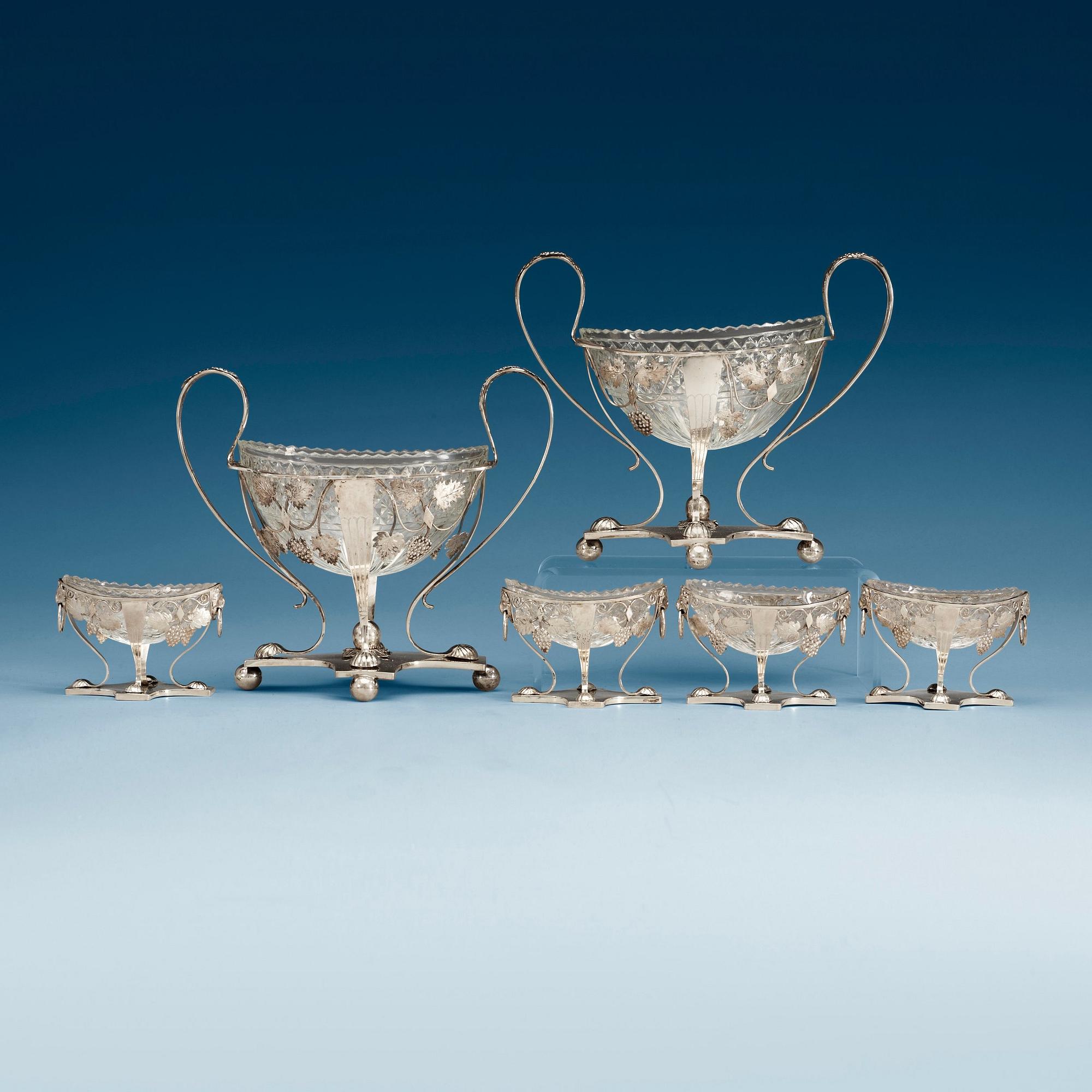 A set of six Danish silver and glas sugar-bowls and salts, marks of Mogens Klarschow, Copenhagen 1821.