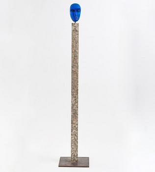 Bertil Vallien, a unique sand casted blue glass 'Head' sculpture on a hewn and polished limestone plinth, Kosta Boda, Sweden.