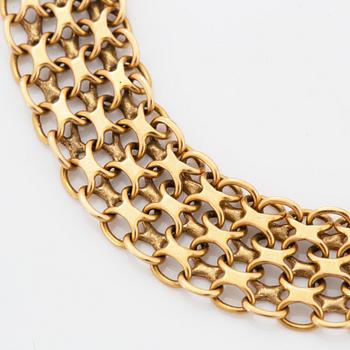18K gold bracelet.