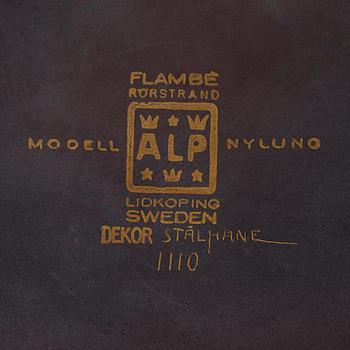 A flambé stoneware jar with cover by Gunnar Nylund for Rörstrand.