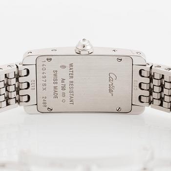 A Cartier "Tank Américane" 18K white gold watch set with round brilliant-cut diamonds.