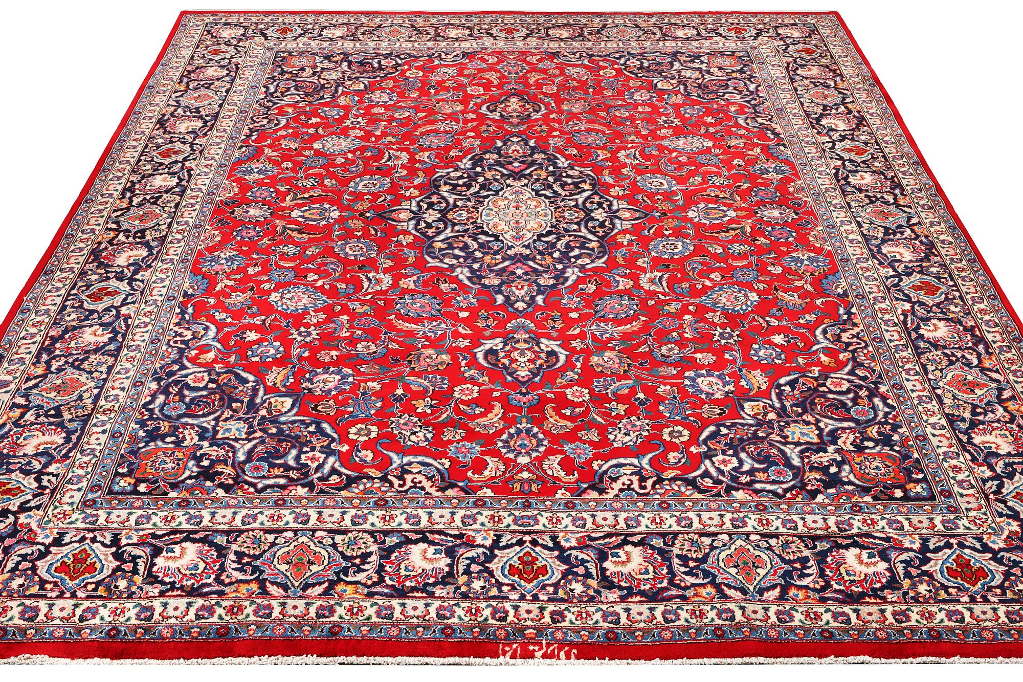 A Keshan carpet, c. 390 x 290 cm.