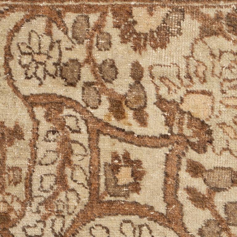 An antique Tabriz carpet, Northwest Persia, 453 x 310 cm.