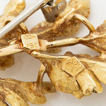 Brosch i form av ett löv 18K guld.