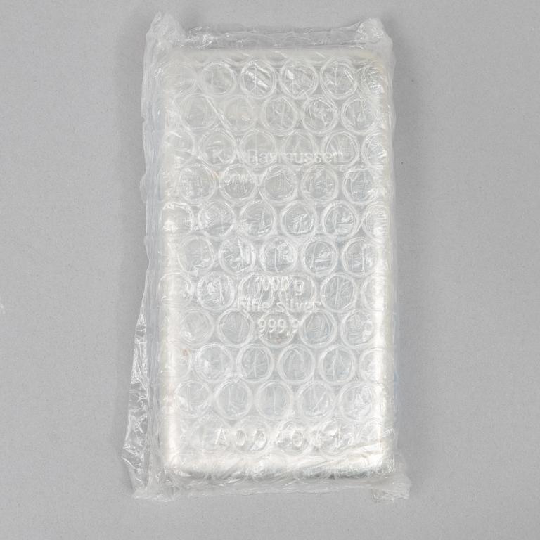 Silvertacka, 1000 gram finsilver, K.A. Rasmussen, Norge.