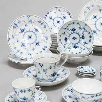 A 73-piece 'Blue Fluted Plain' porcelain tableware set, Copenhagen, Denmark, mostly 1940s-60s.