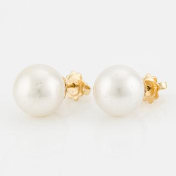 Earrings with cultured South Sea pearls.