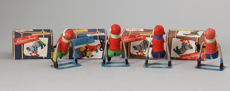 A set of four German Schucofigures.