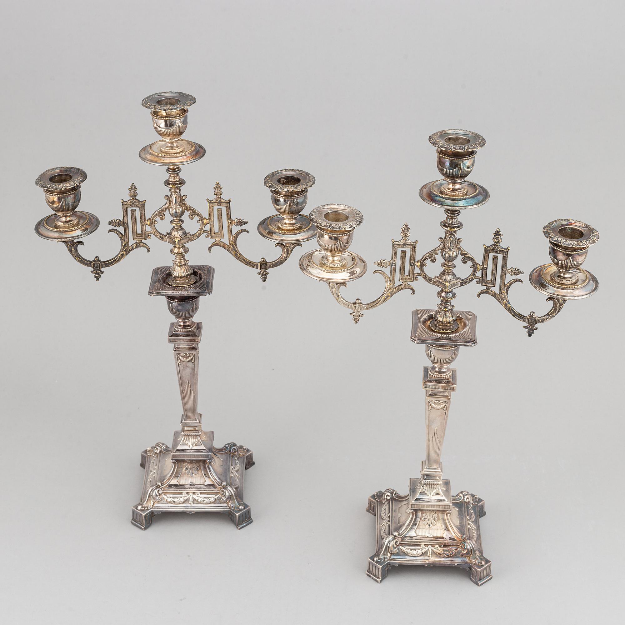 A pair of silver plated candelabras, early 20th century.