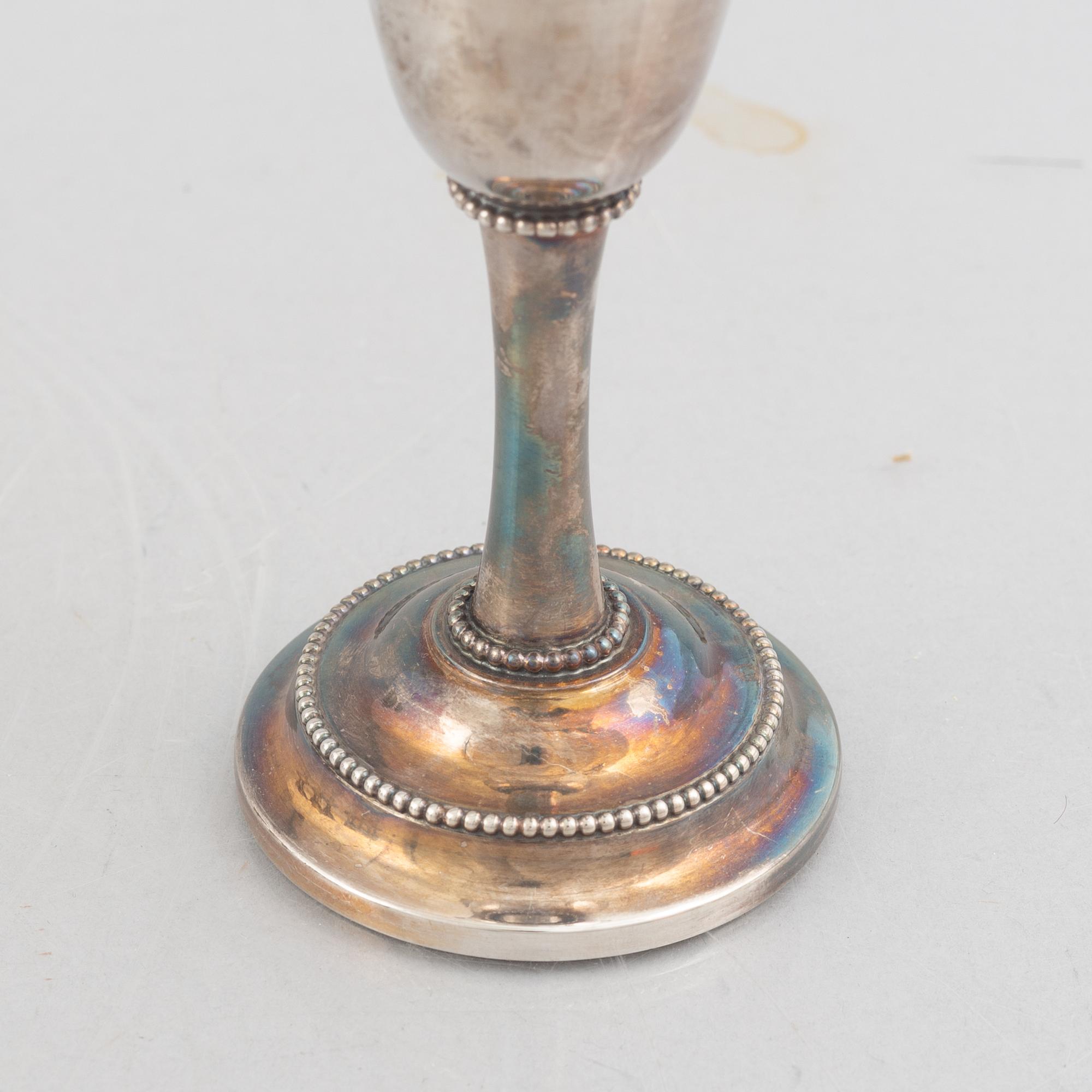 Karl-Axel Karlsson Silversmed, twelve sterling silver cups, Stockholm 1975-85.