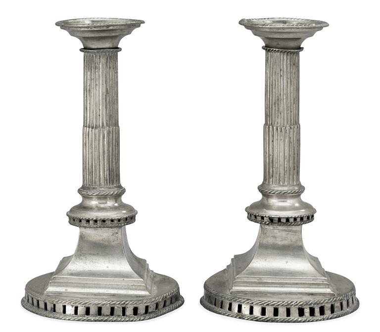 A matched pair of late Gustavian pewter candlesticks by G. F. Baumann.
