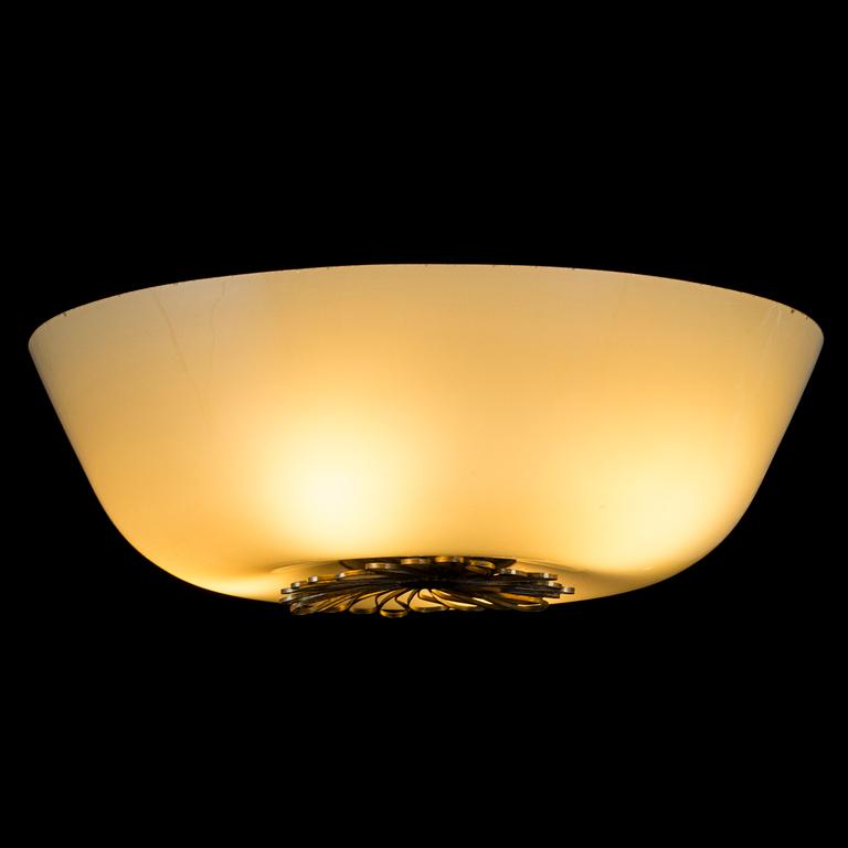 A mid-20th century ceiling lamp manufactured by Taito.