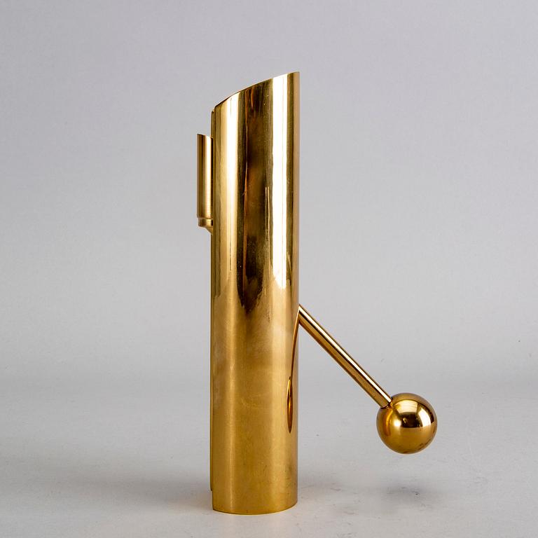 A Pierre Forssell brass candle stick for Skultuna.