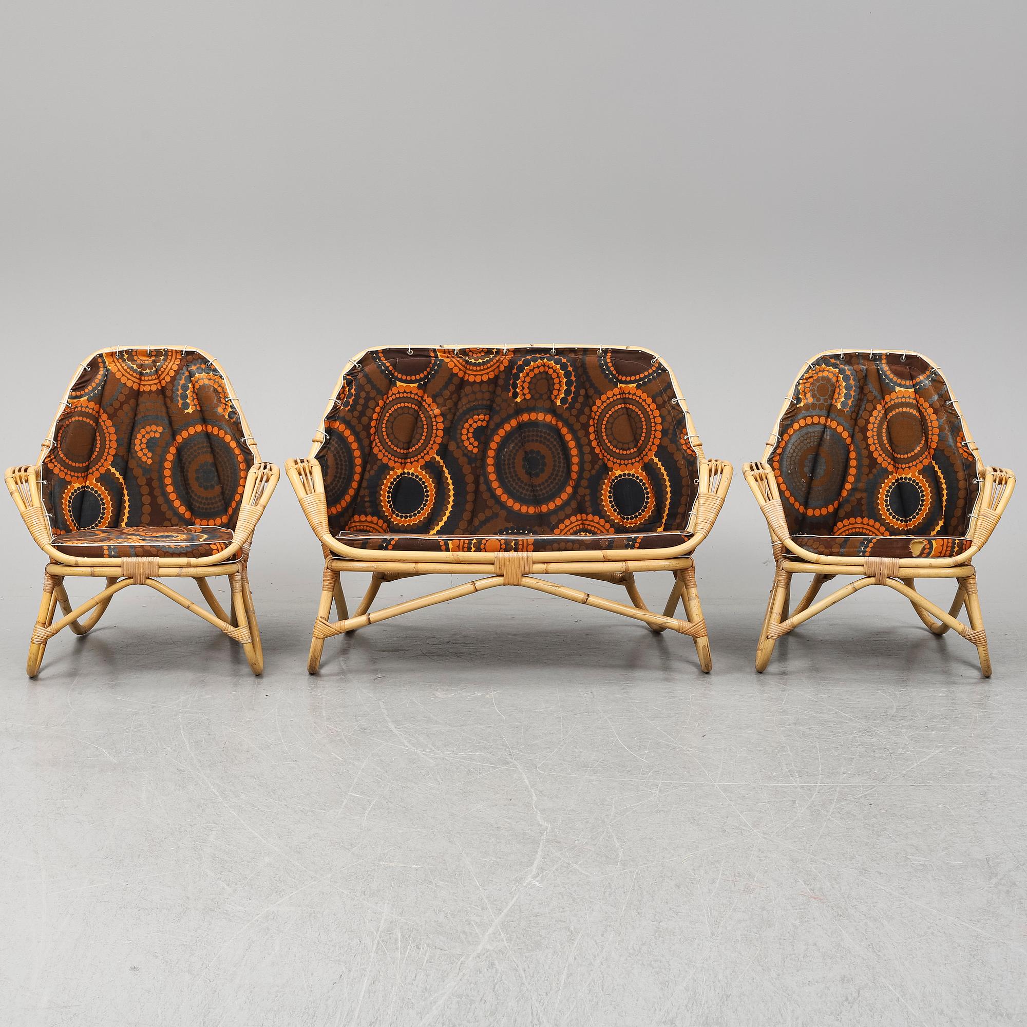 A sofa and two easy chairs, 1960s.