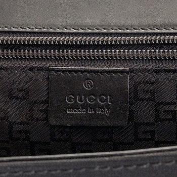 Gucci, laptop-laukku.