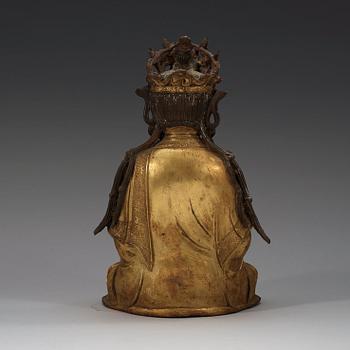 A gilt-bronze figure of a seated Guanyin, Ming dynasty (1368-1644).