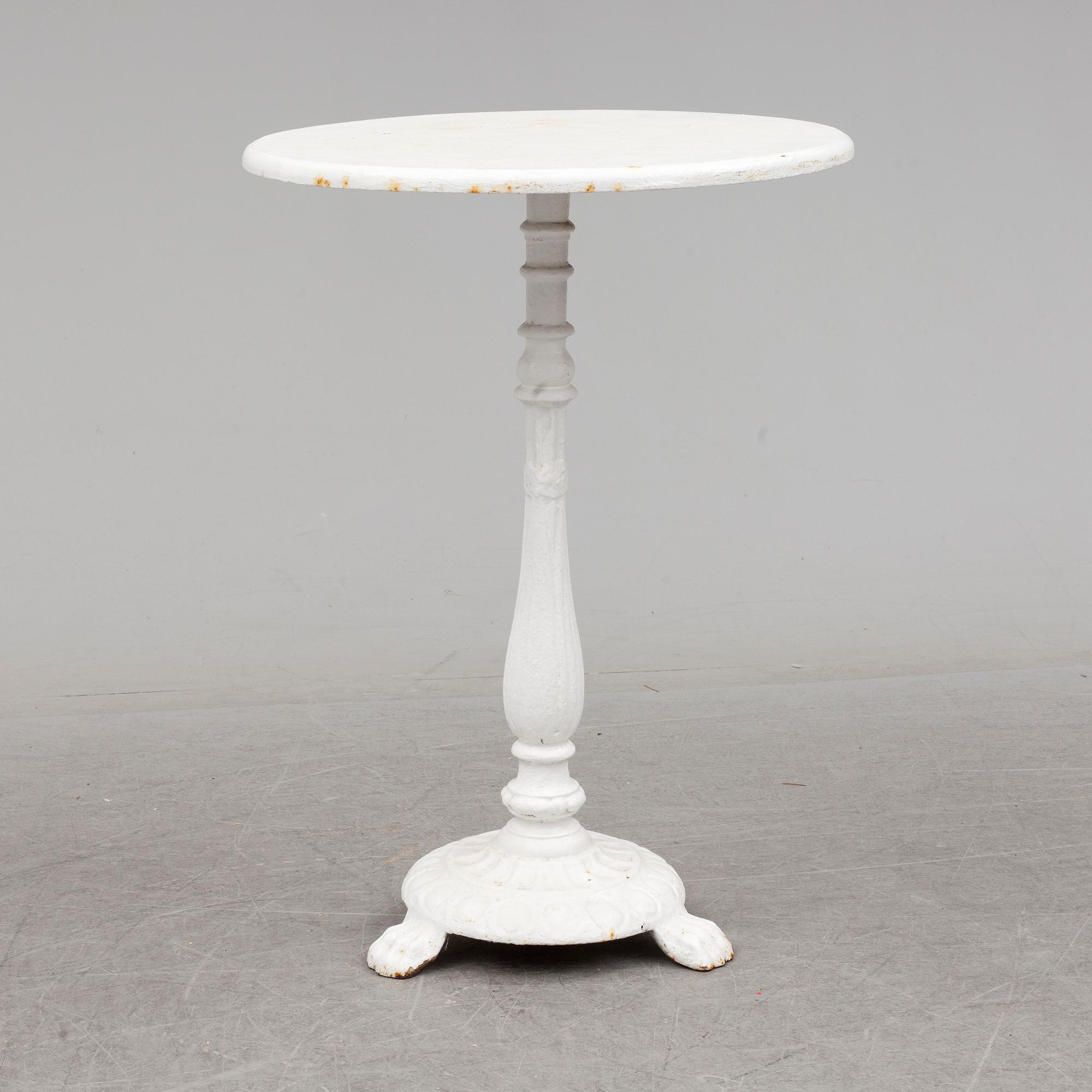 an early 20th century cast iron table.