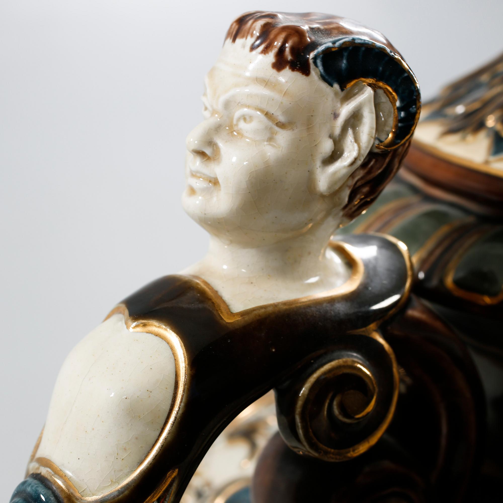 A majolica urn with pedestal from Rörstrand, around the year 1900.