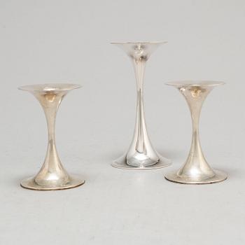 TAPIO WIRKKALA, three 'Trumpetti' silver candlesticks from Kultakeskus Oy, Hämeenlinna, Finland, 1974-93.