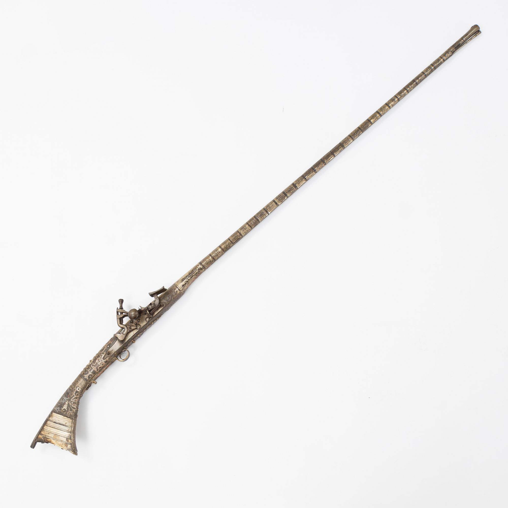 A snaphaunce gun, 19th Century.
