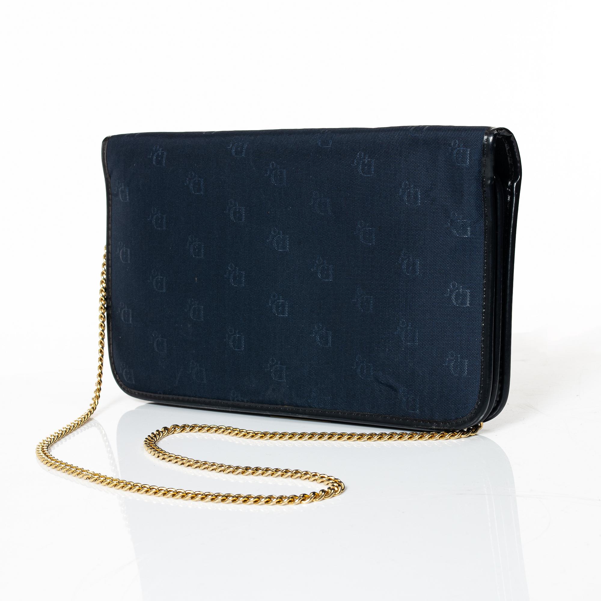 Christian Dior, aftonväska samt paraply.