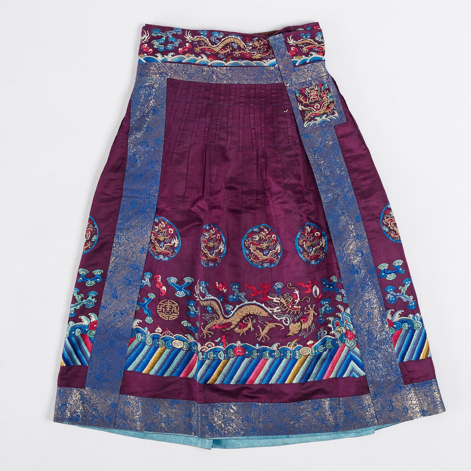 An embroidered silk skirt, Qing dynasty (1644-1912).