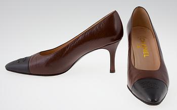 35. A pair of Chanel pumps.