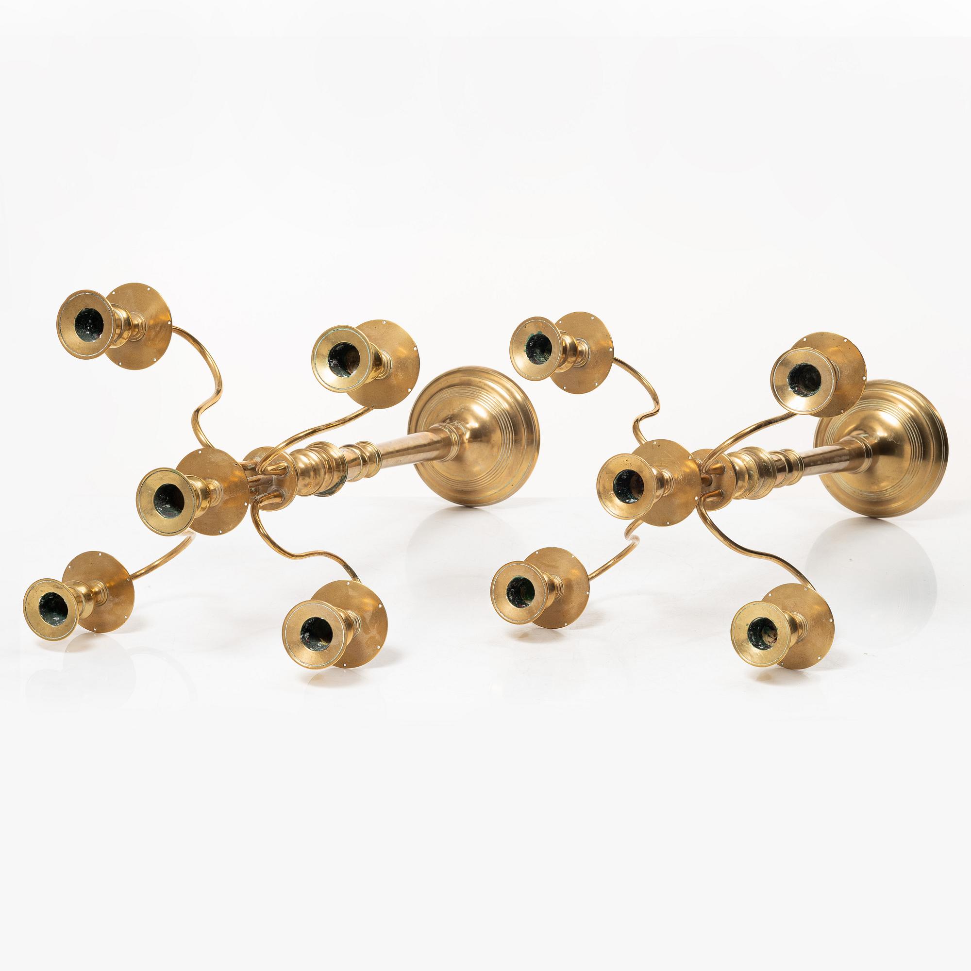 A pair of brass candelabra, model N12, Nyköpings Bruk, Sweden, around 1900.