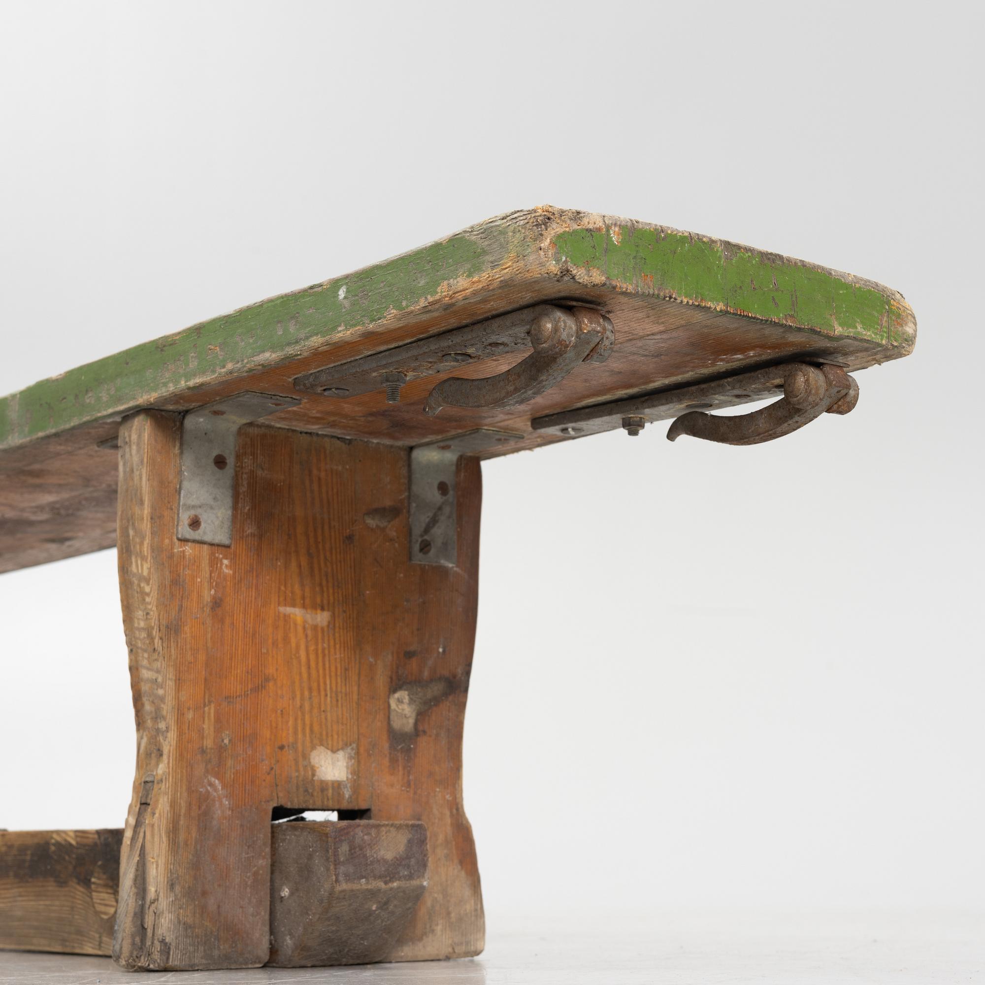 A painted bench, 20th Century.