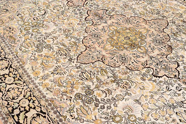 A CARPET, old silk Kashmir, ca 380 x 274 cm.
