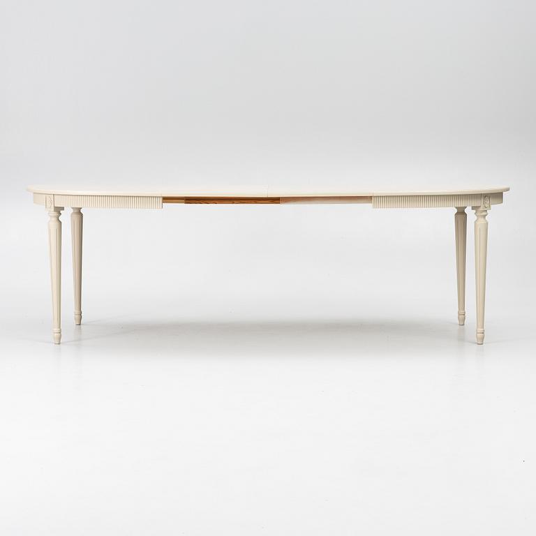 A dining table with 10 chairs, Gustavian Style dining suite, second half of the 20th century.