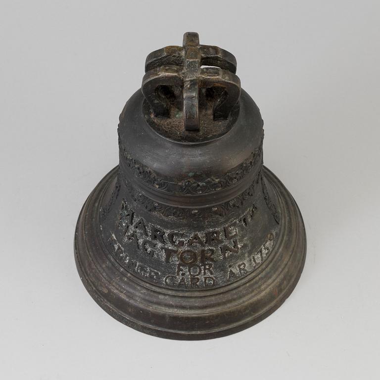 A BRONZE AND IRON BELL, dated 1759.