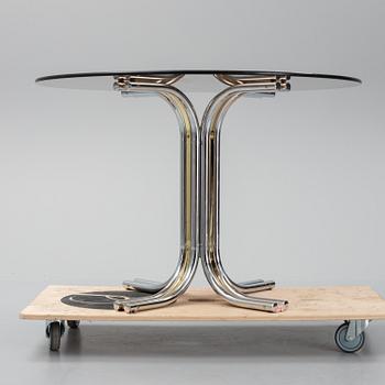 An iIalian glass top dining table, 1970's/80's.