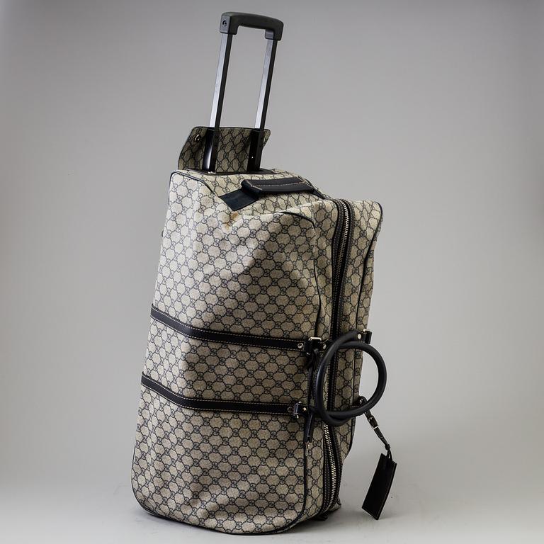 VÄSKA/RULLVÄSKA, Gucci.