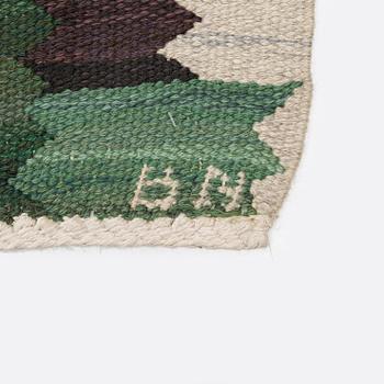 Barbro Nilsson, a carpet 'Nejlikan grön', flat weave, c. 390 x 278 cm, signed AB MMF BN.