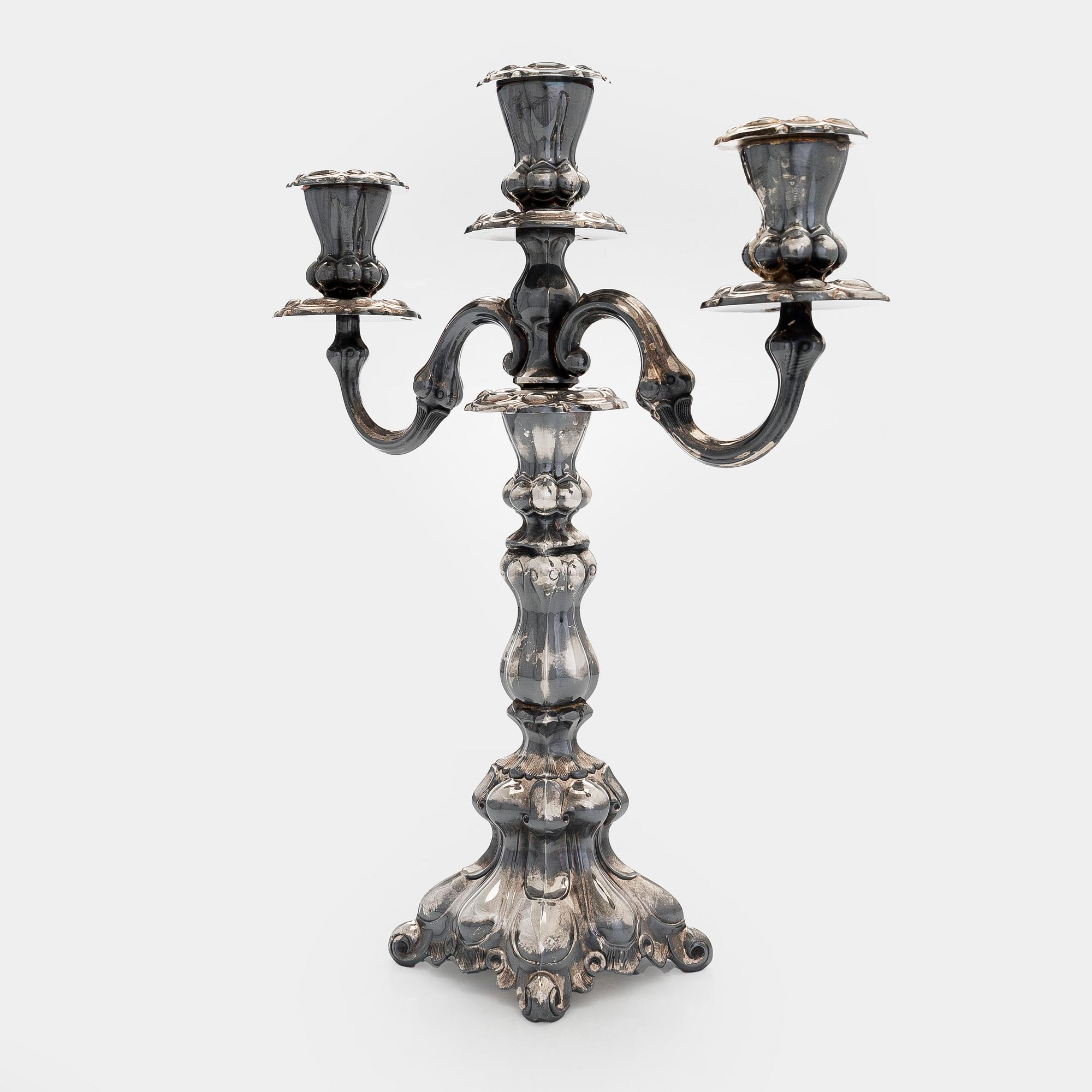 Kynttelikkö, hopea, Kultakeskus, Hämeenlinna 1990.