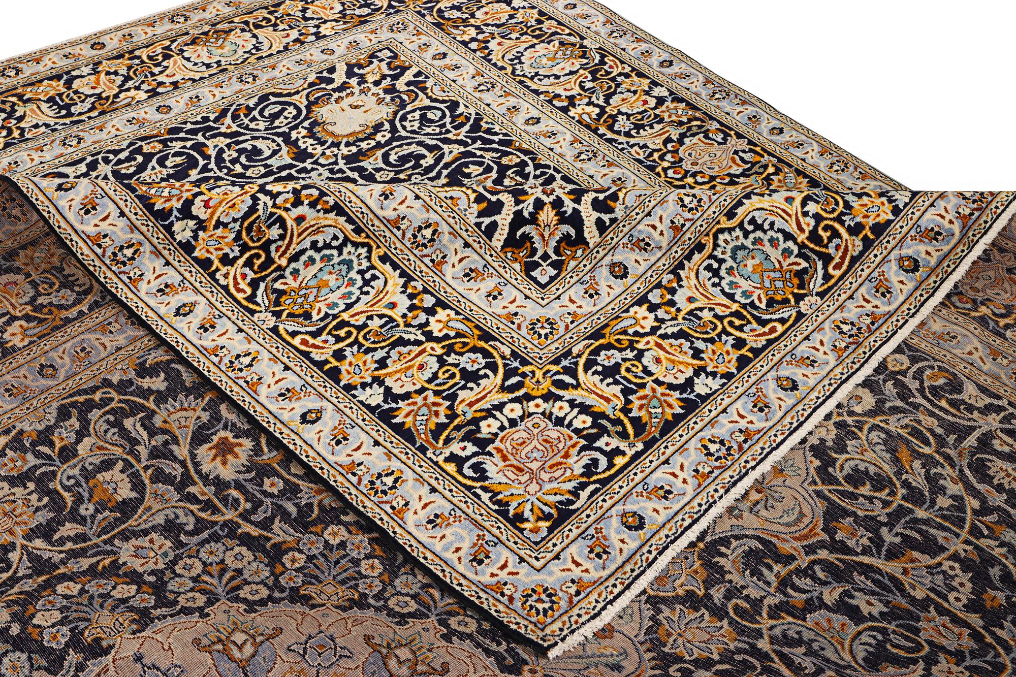 A Kashan carpet, c. 383 x 310 cm.