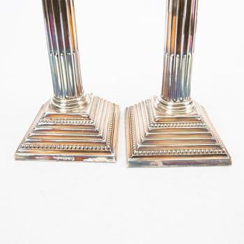 A pair of 20th century English silver candle sticks London 1965.