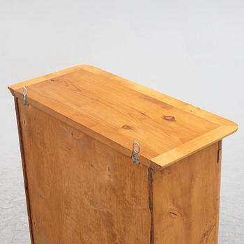A small wall cabinet, around 1900.
