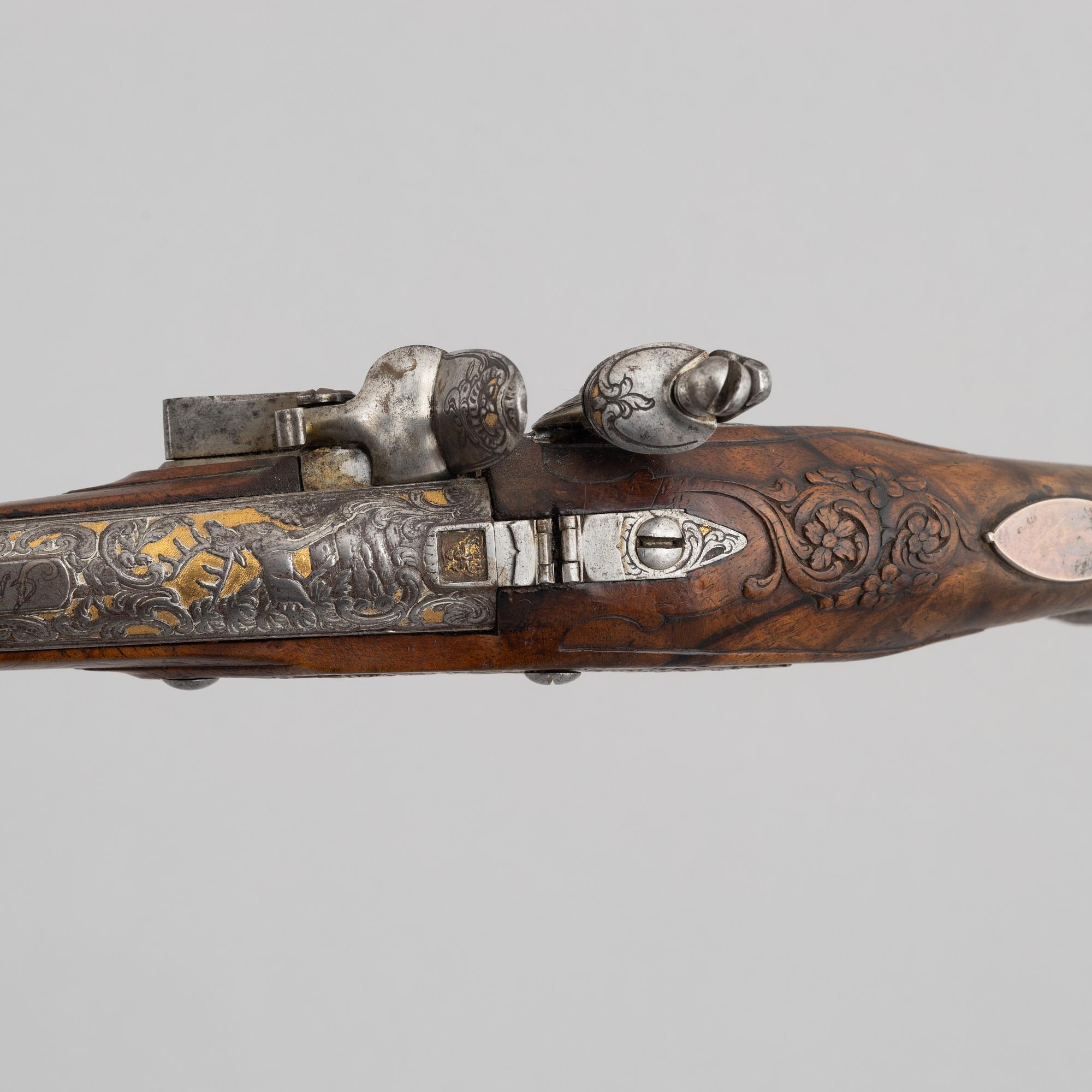 A Pair of flintlock pistols, by Johann Jacob Kuchenreuter, (Regensburg 1709-1783, Royal gunsmith).