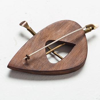 Vivianna Torun Bülow-Hübe, a wooden and brass brooch, executed in her own workshop, Stockholm ca 1948-52.