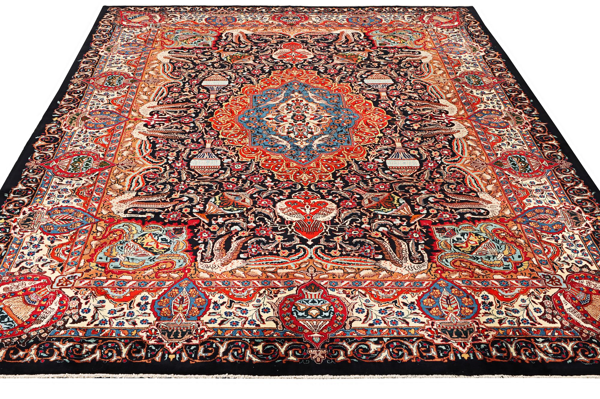 A Kashmar carpet, c. 390 x 305 cm.