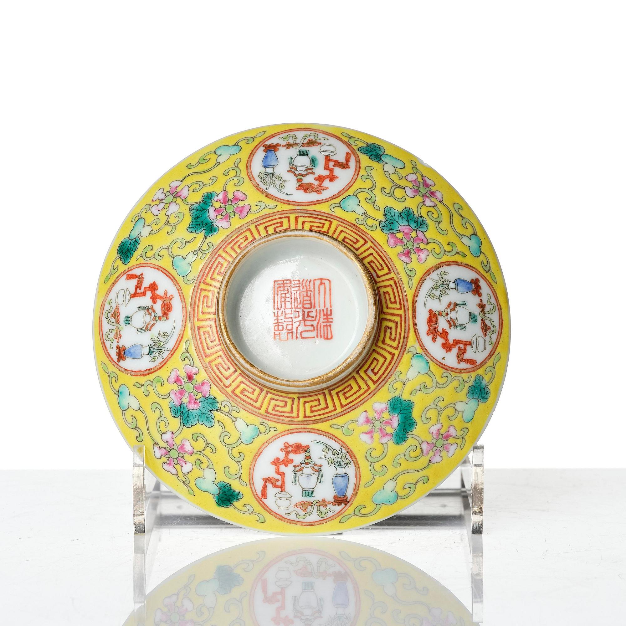 A pair of yellow ground 'medallion' bowls with covers, Qing dynasty with Daoguang mark.