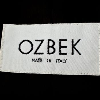RIFAT OZBEK, a black jacket.