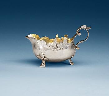 880. A Swedish parcel-gilt cream-jug, makers mark of Lorentz Wretman, Landskrona 1774.