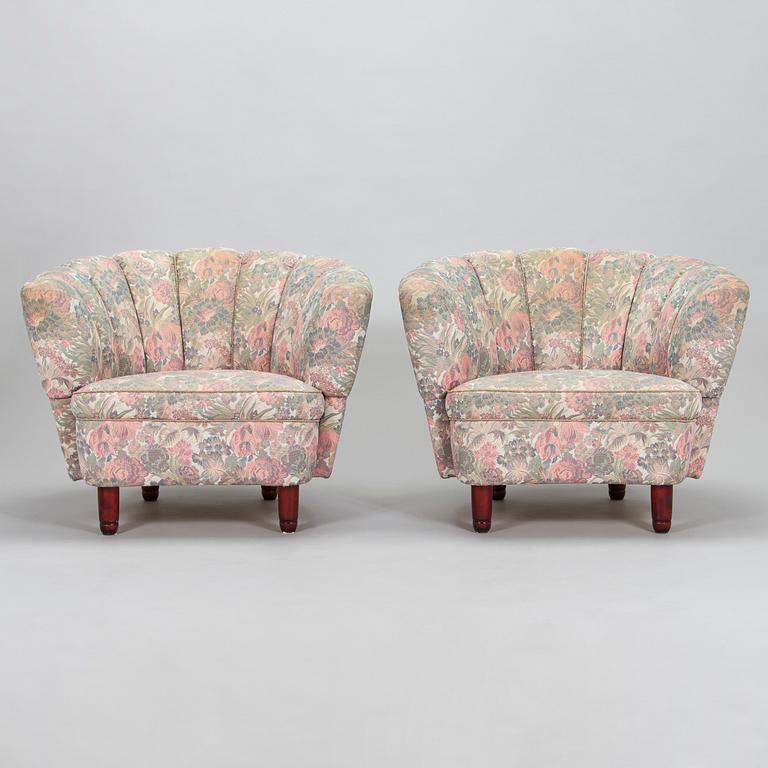 A pair of late 20th century armchairs.