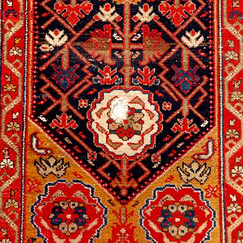 An antique Malajir runner ca 505x102 cm.