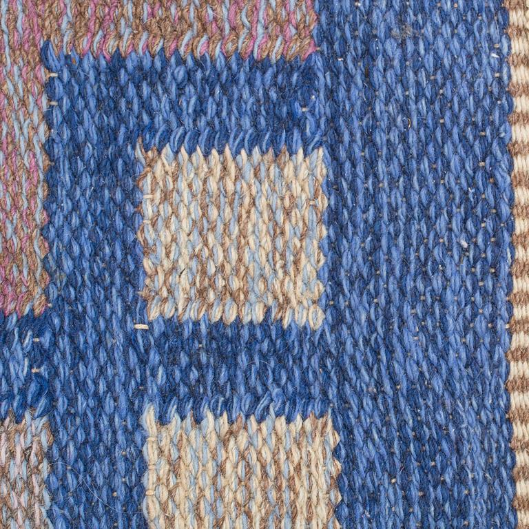 A CARPET, flat weave, around 240 x  166 cm.